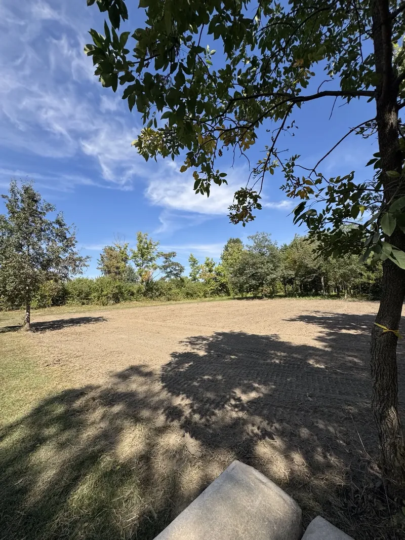 Wooded gravel driveway preparation